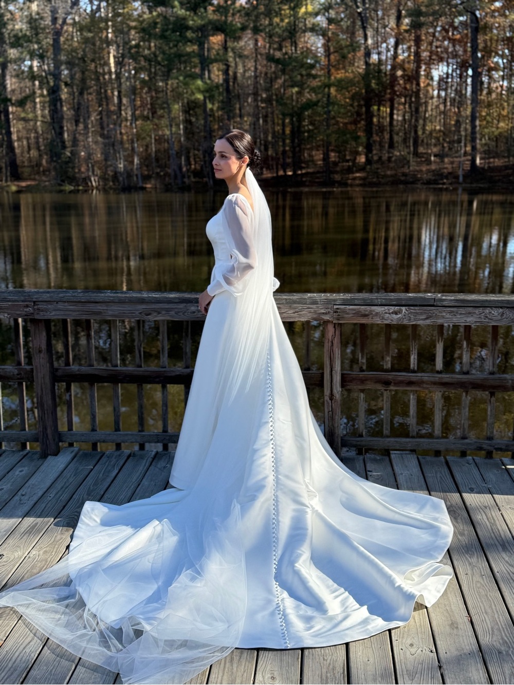 Elegant Ivory Long-Sleeve Bridal Gown + Vail